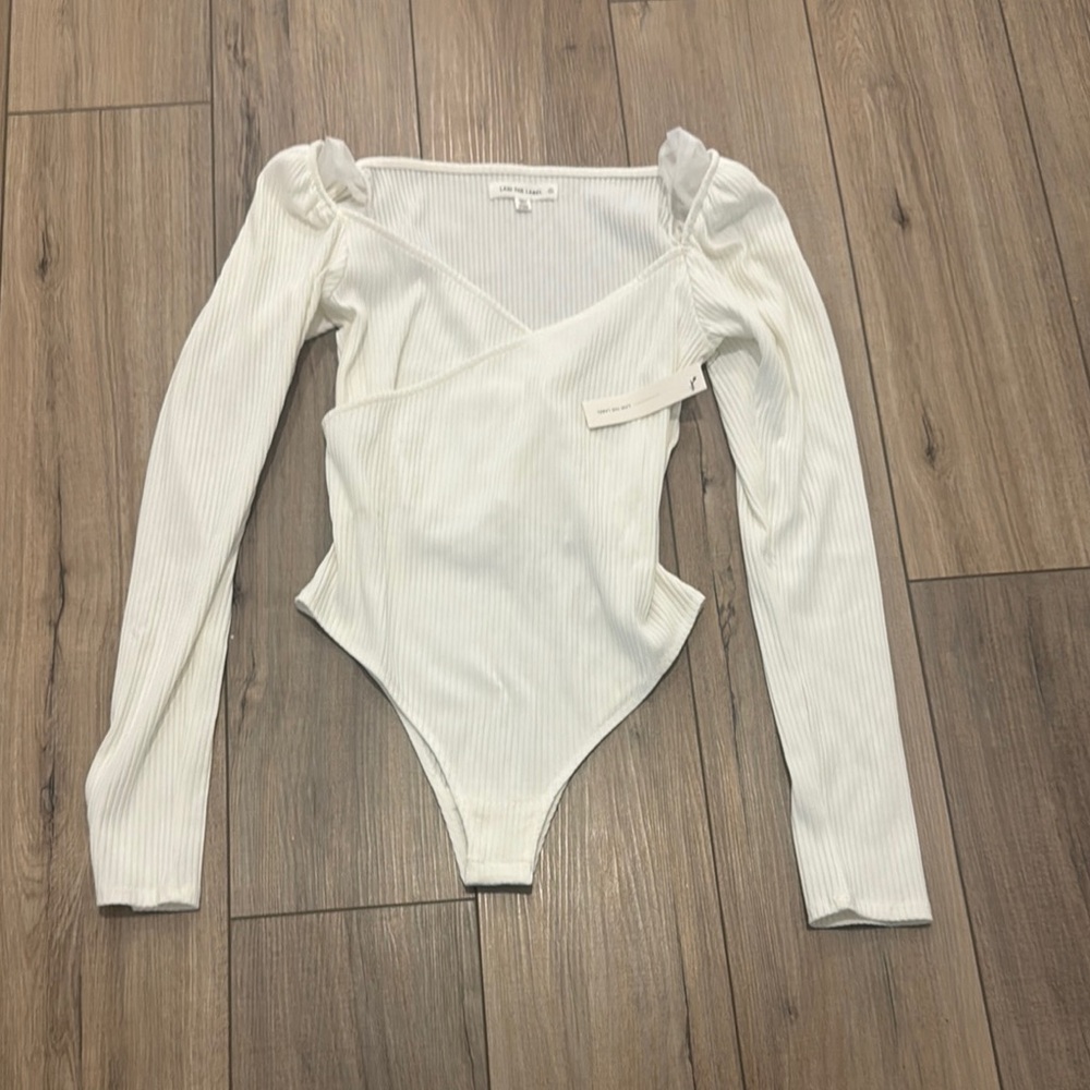 Elegant White Ribbed Bodysuit